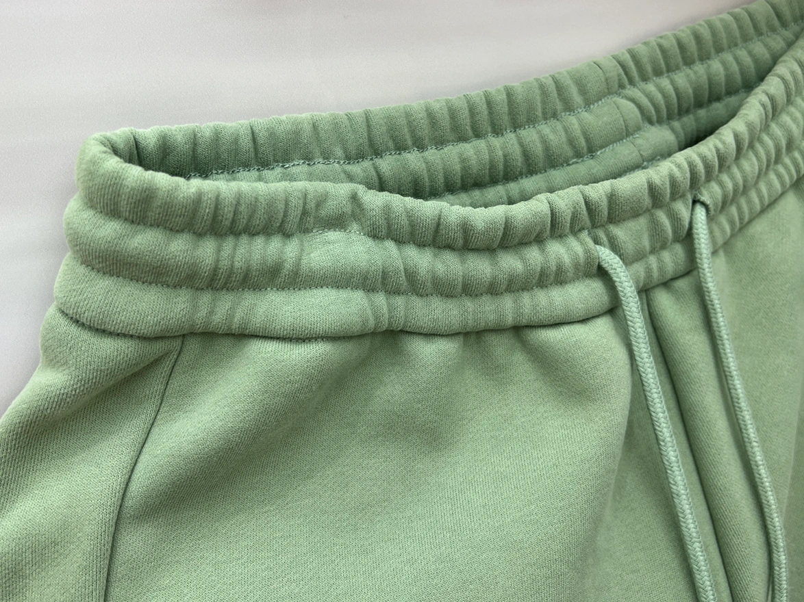 Waistband drawcord and pocket construction reviewed before activewear bulk production
