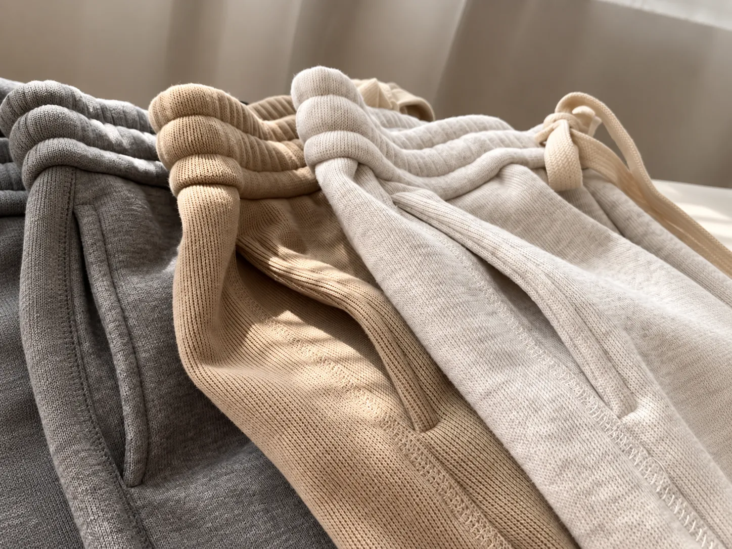 Pocket construction detail on cut-and-sew knit garment