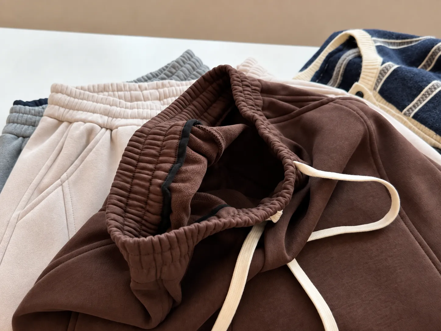 Knit pants elastic waistband and drawcord construction detail