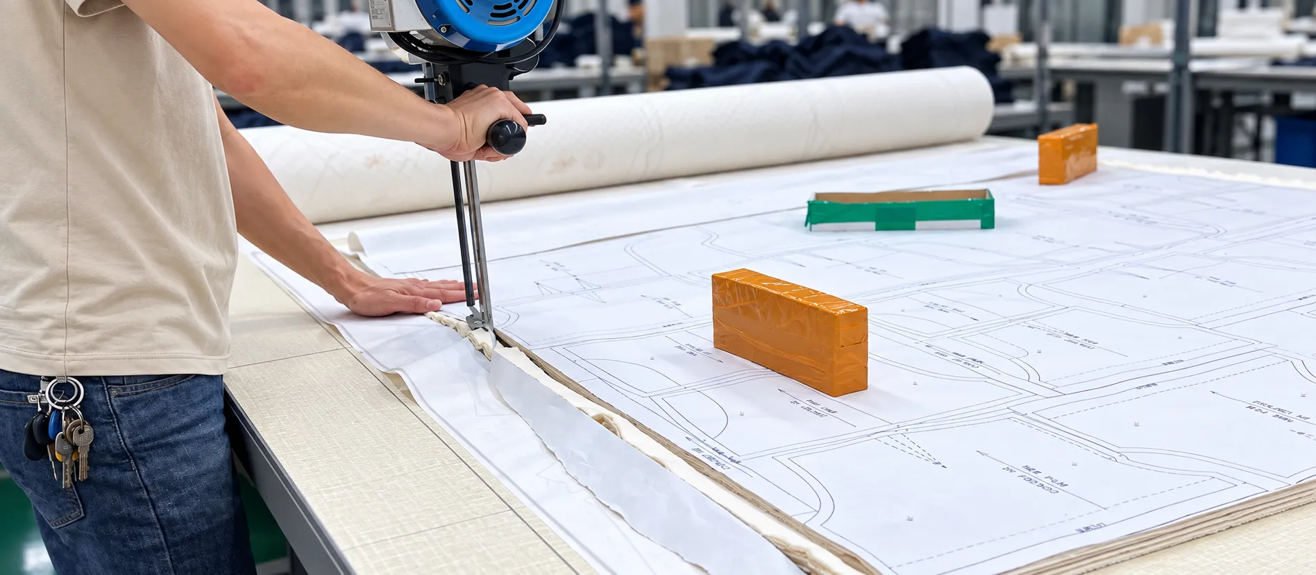 Cut knit garment panels aligned before sewing and garment construction