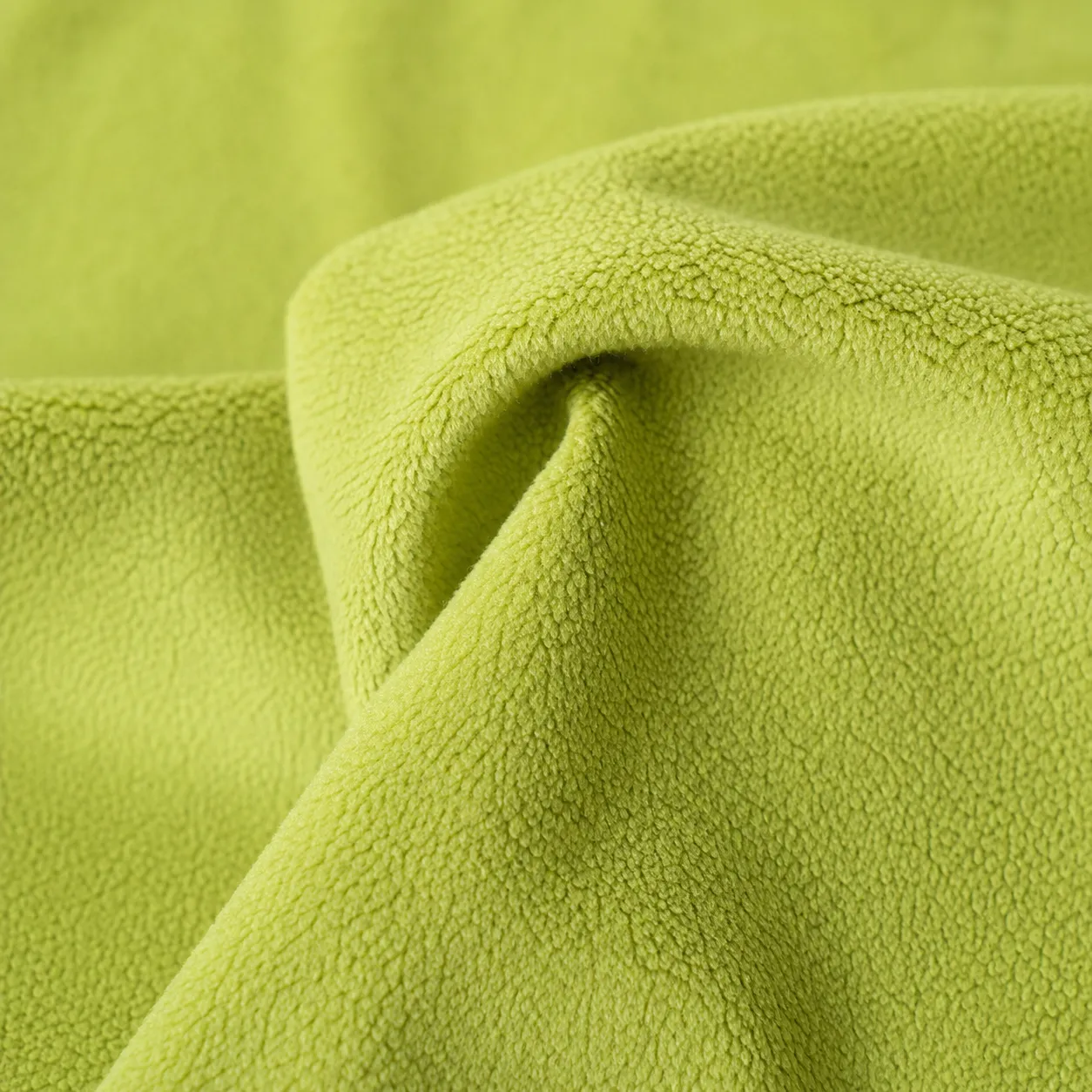 Fleece knit fabric showing brushed interior for heavier cut-and-sew knit garments