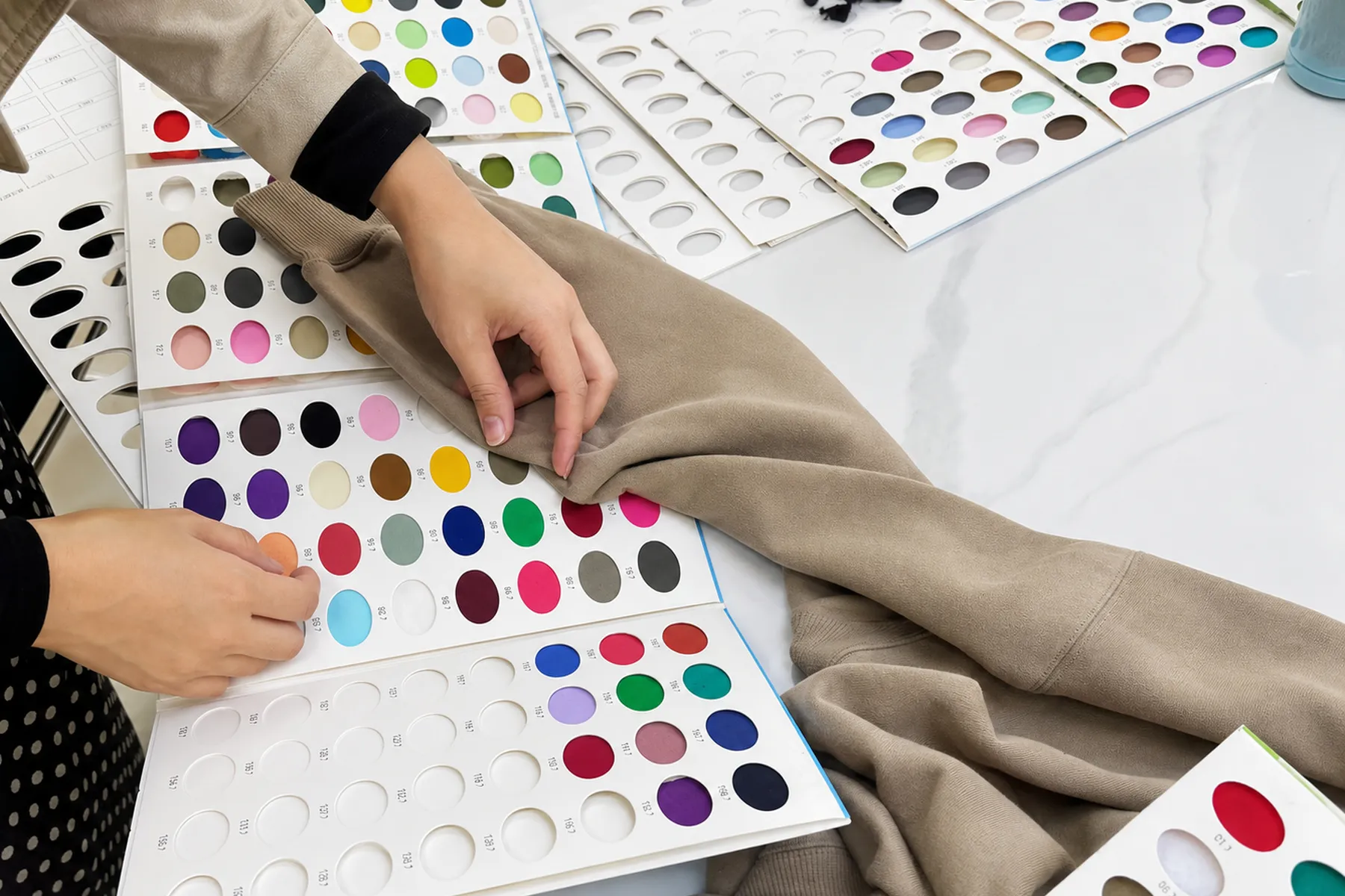 Garment and fabric references reviewed for material direction development