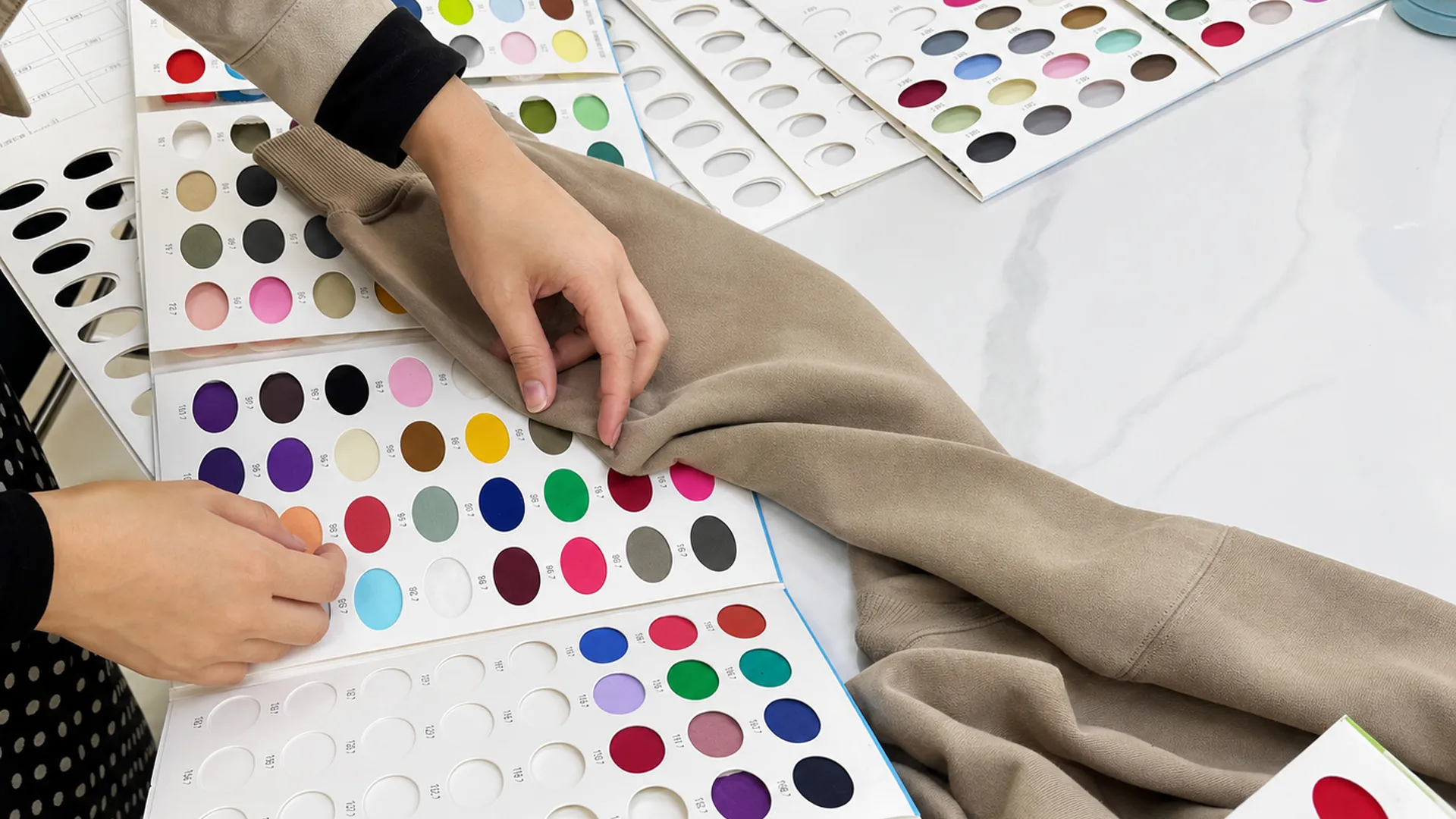 Garment and fabric references reviewed for material direction development