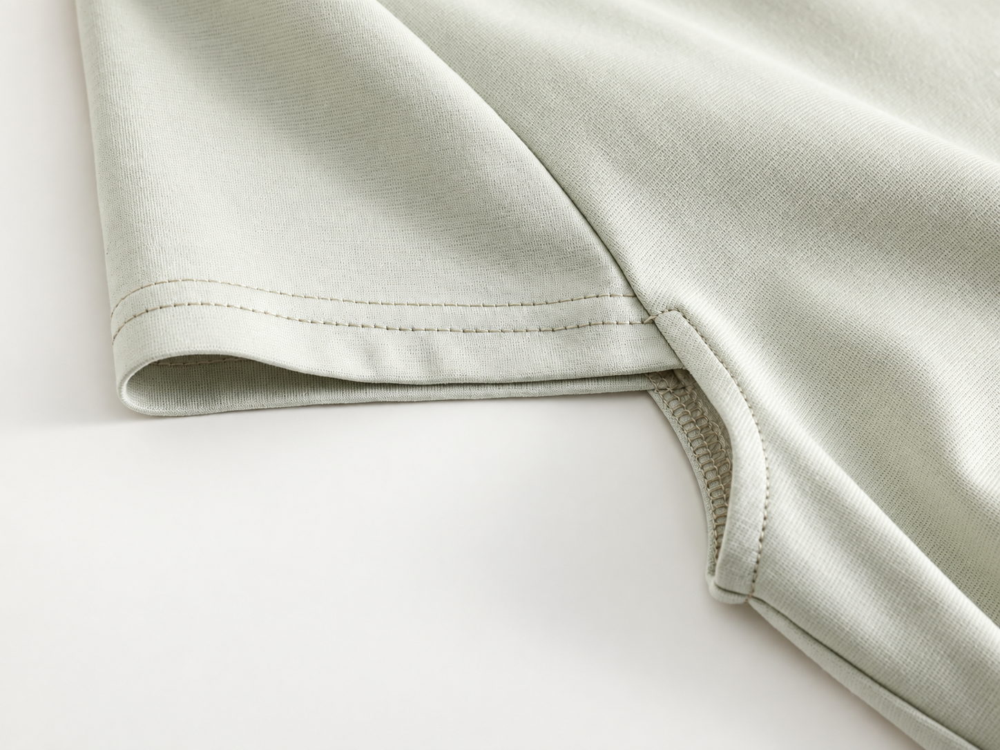 Knit dress armhole and sleeve construction detail