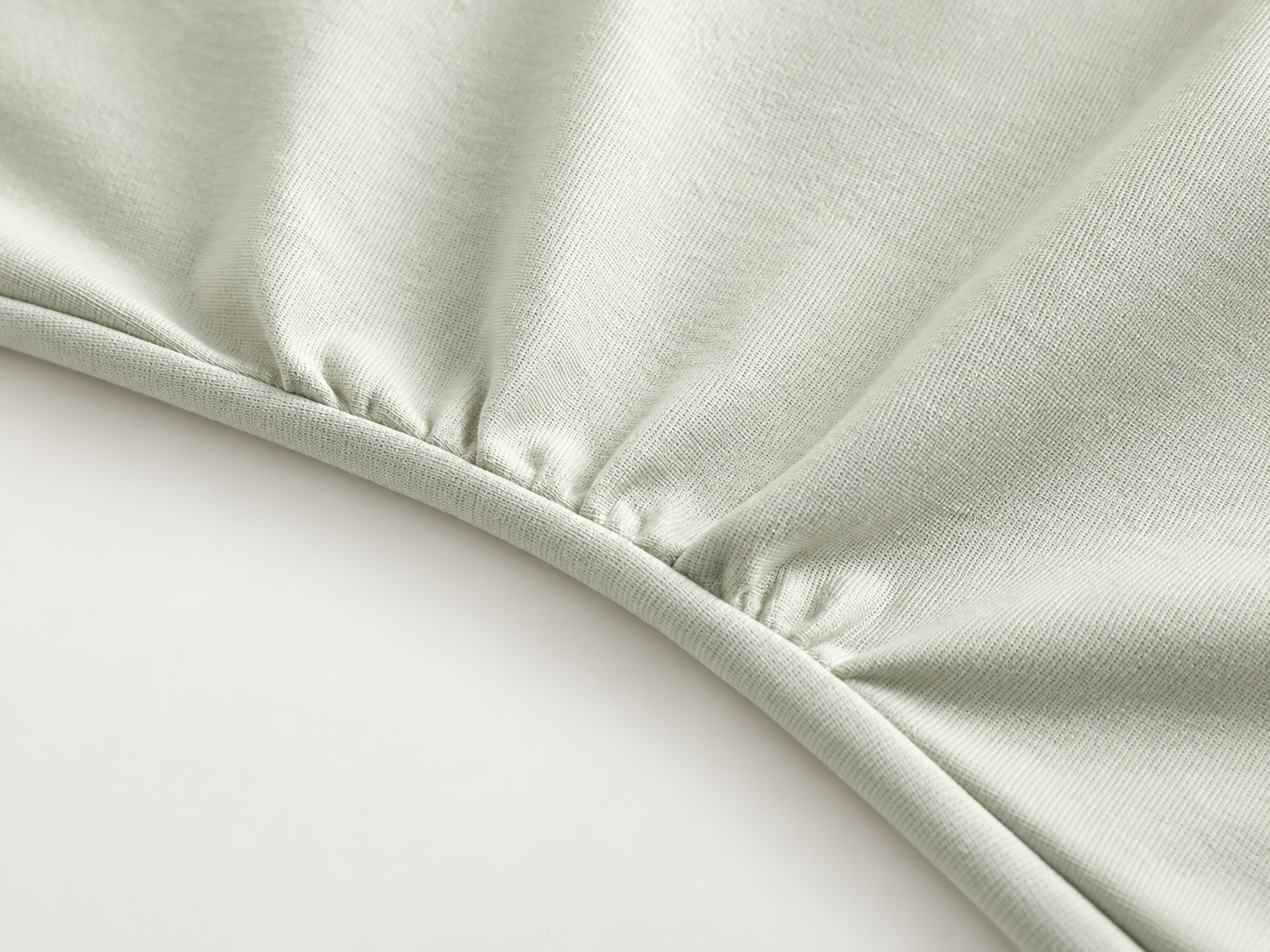 Knit dress waist and body shaping construction detail