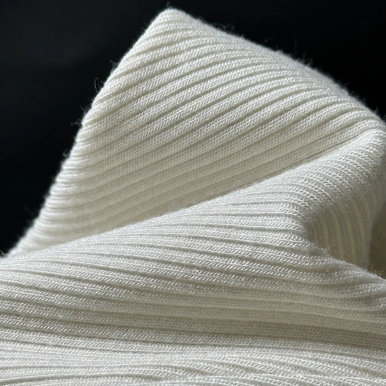 Rib knit fabric showing stretch and recovery for collars cuffs and waistbands