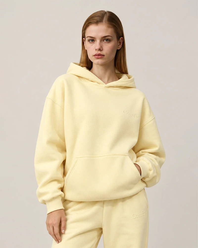 Cut-and-sew hoodie showing hood, rib, pocket and sweatshirt construction